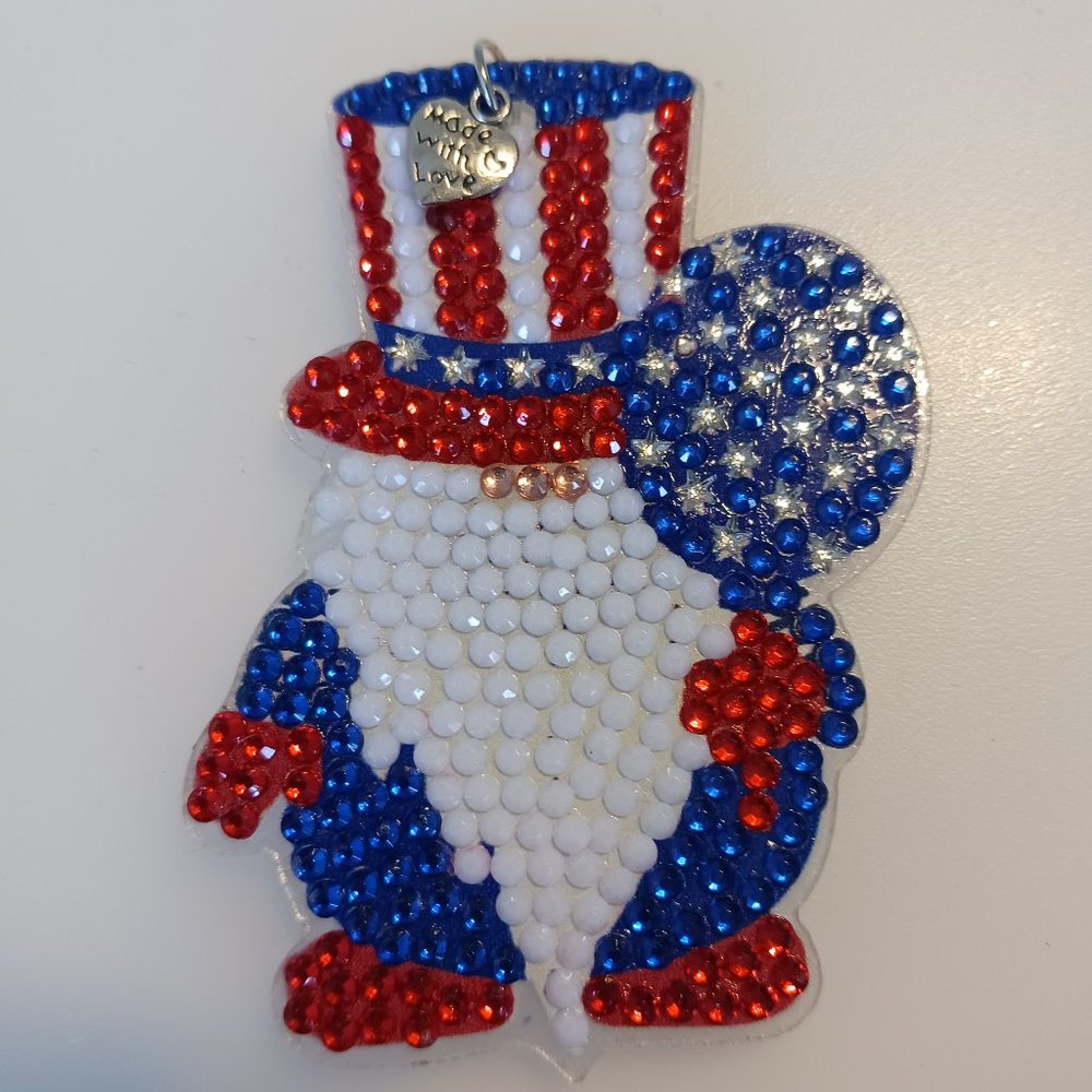 Gnome magnet with metal heart charm